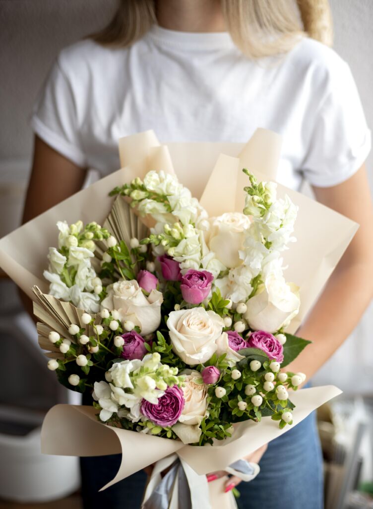 woman-holding-flowers-bouquet-close-up (002)